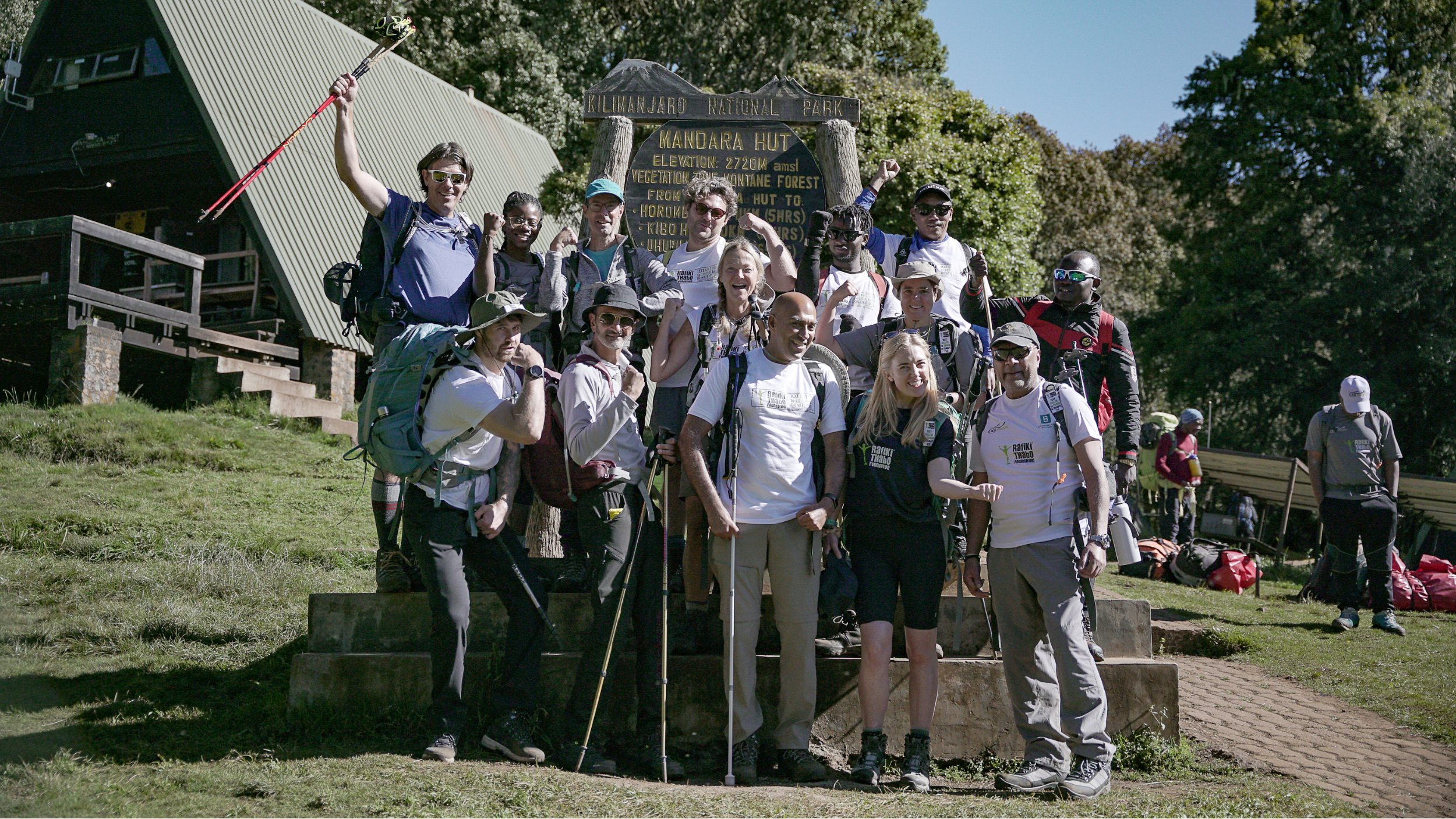 An image of the trekkers triumphant after their summit.