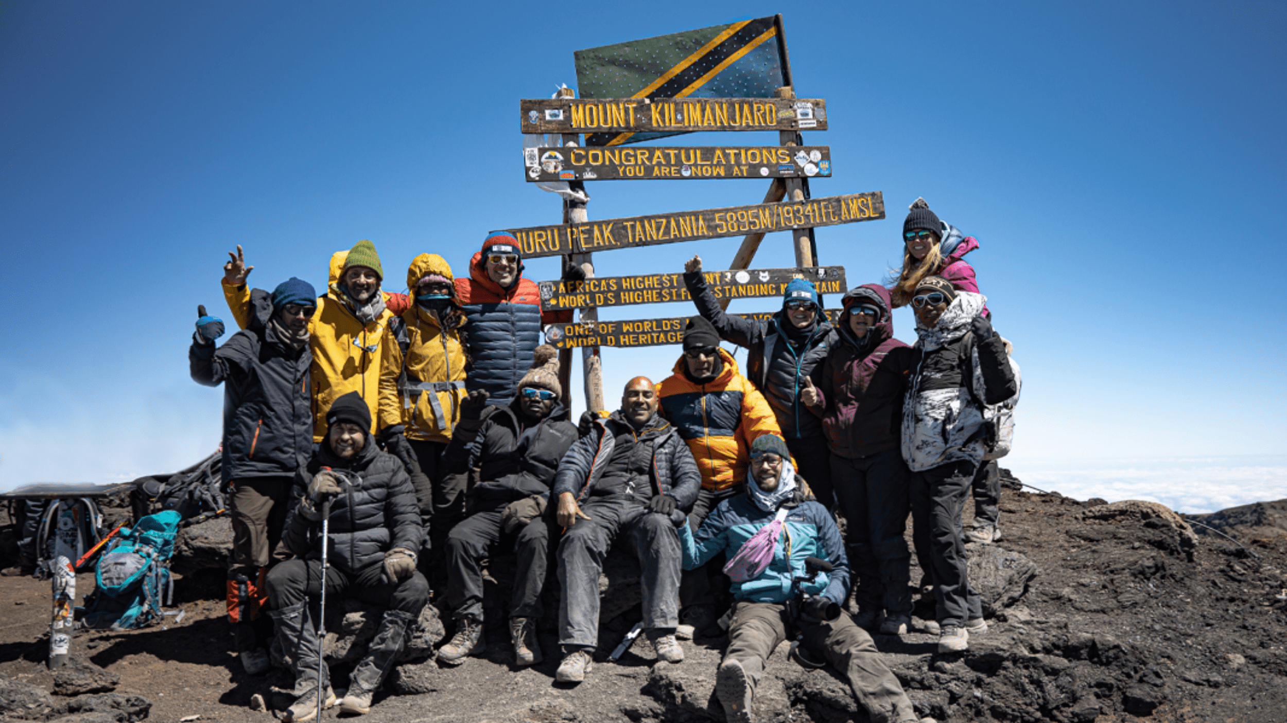 An image of the happy, successful trekkers on top of Kilimanjaro!